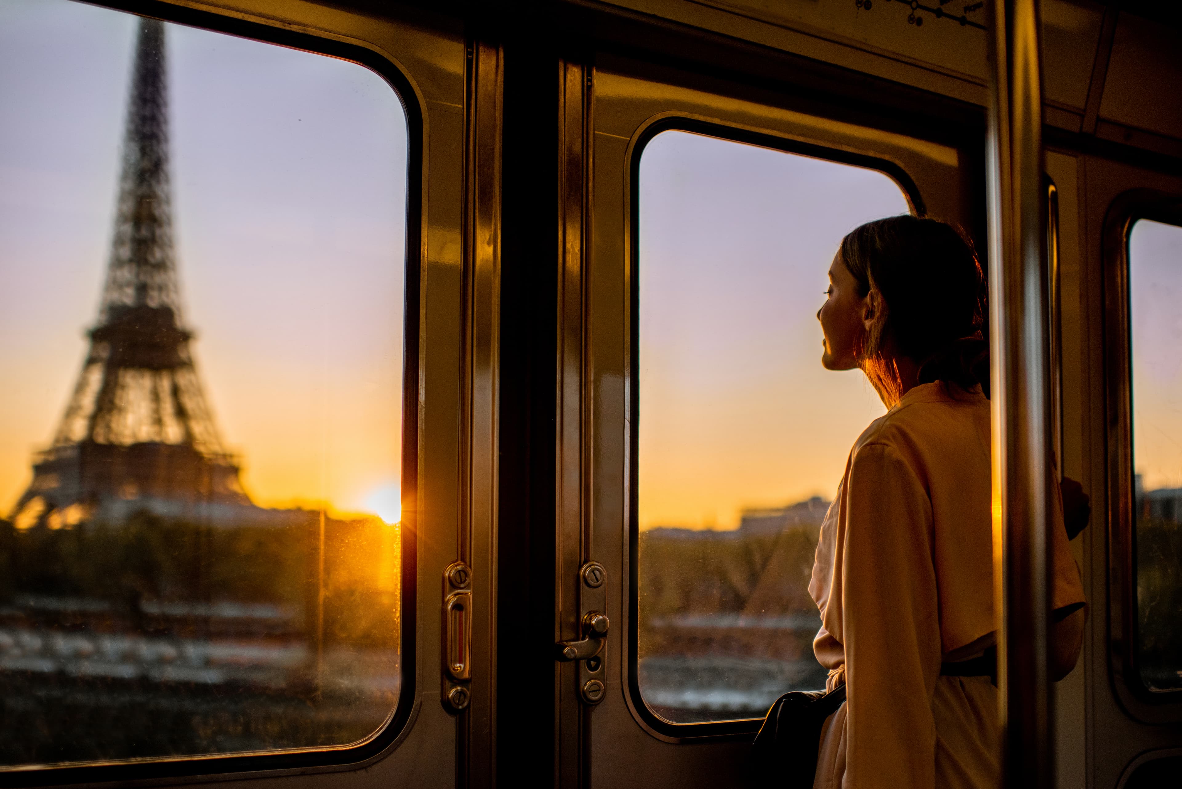 Woman riding the train in Paris